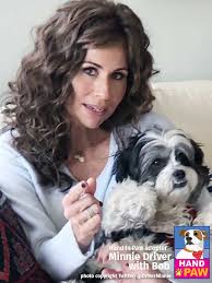 A high-resolution thumbnail for a California dog adoption blog featuring a happy family hugging a newly adopted Goldendoodle in a sunlit California park. The image includes bold, professional text overlays reading 